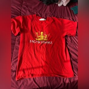 FAO Schwarz red and yellow tee from the 2000s
